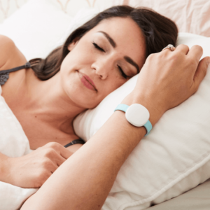 Overnight, the Ava sensor bracelet collects continuous data while you sleep